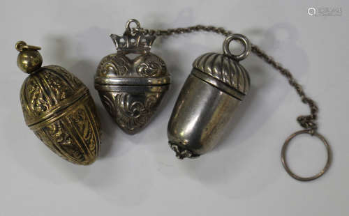 A late 19th/early 20th century Continental silver heart shaped pill box with foliate scroll