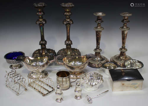 A pair of George III Sheffield plate candlesticks, each with a detachable nozzle and cast with