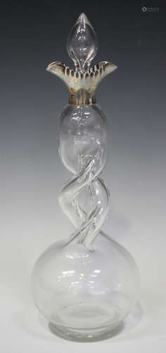 A late Victorian silver mounted clear glass decanter and stopper with globular body and double-twist