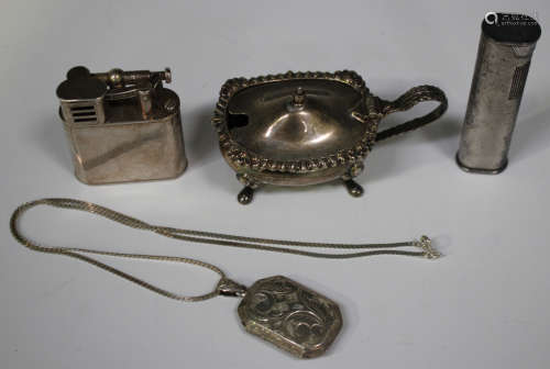 A silver mustard, Birmingham 1959, a sterling pendant locket and chain and two Dunhill plated petrol