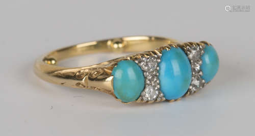 A gold, turquoise and diamond ring, mounted with three oval turquoise alternating with two rows of