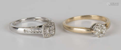 A 9ct gold and diamond set seven stone cluster ring, mounted with circular cut diamonds, ring size
