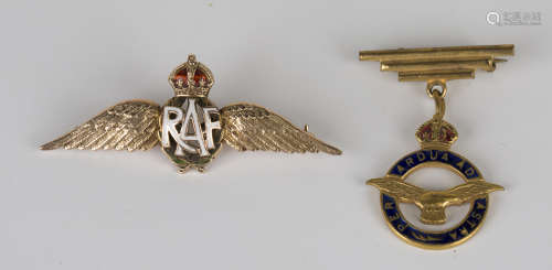 A gold, white, green and red enamelled brooch, designed as the badge of the Royal Air Force,