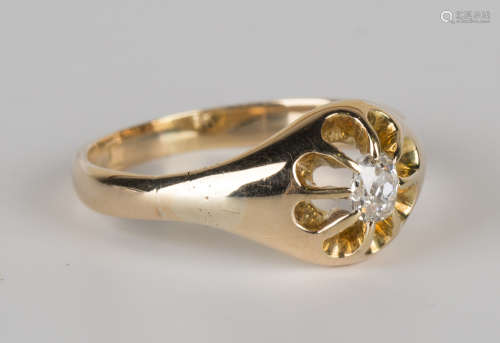 A gold and diamond single stone ring, claw set with a cushion shaped diamond, ring size approx R1/