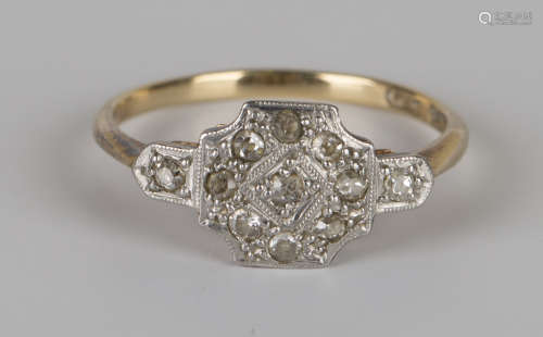 A gold, platinum and diamond cluster ring, mounted with nine cushion shaped diamonds between diamond