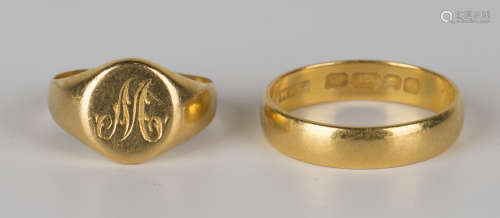 A 22ct gold plain wedding ring, ring size approx O1/2, and a gold signet ring, ring size approx K.