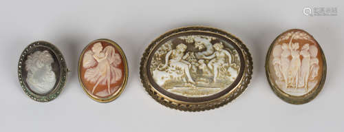 A 9ct gold mounted oval shell cameo brooch, carved as a classical scene of two seated maidens in a
