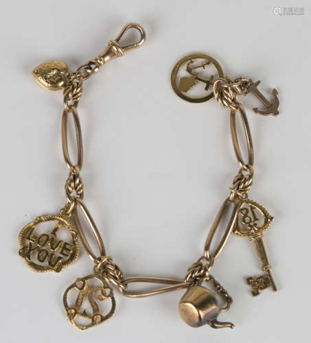 A 9ct gold open curb and multi-link bracelet with a swivel clasp, fitted with six 9ct gold charms,