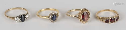 A gold, sapphire and diamond oval cluster ring, detailed '18ct', a 9ct gold, sapphire and colourless
