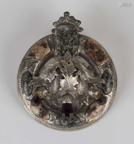 A Scottish silver, vari-coloured granite and mauve paste brooch, circa 1900, designed as a spray
