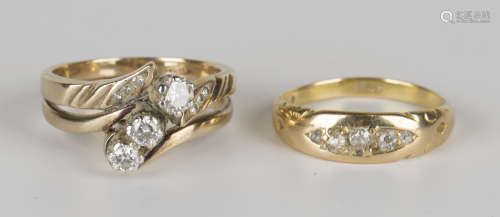 A 9ct gold and diamond ring, mounted with three circular cut diamonds with diamond set three stone