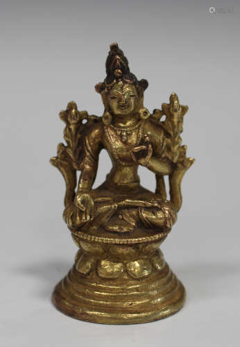 A Sino-Tibetan gilt bronze figure of Tara, probably 20th century, of diminutive form, modelled