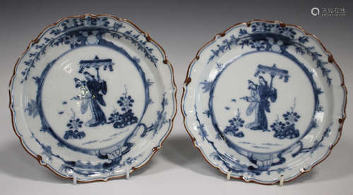 A pair of Japanese Arita blue and white porcelain plates, 18th/19th century, each painted with a