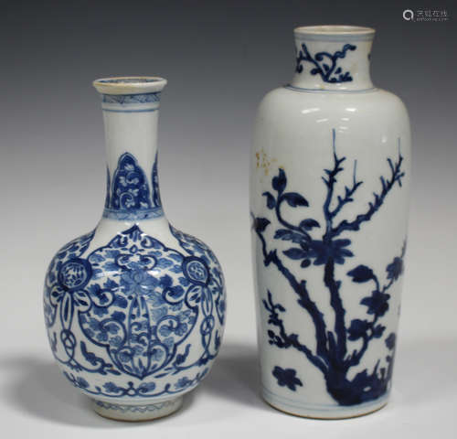 A Chinese blue and white porcelain bottle vase, Kangxi period, the globular body with flared