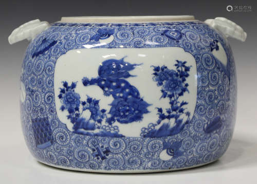 A Japanese blue and white porcelain jar, Meiji period, of compressed circular form with moulded