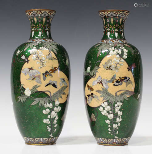 A pair of Japanese cloisonné vases, Meiji period, of elongated ovoid form with short flared necks,