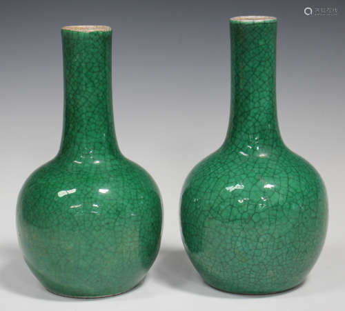 A pair of Chinese green crackle glazed porcelain bottle vases, early 20th century, each globular