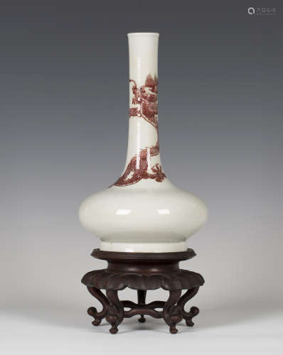 A Chinese underglaze red decorated porcelain bottle vase, mark of Kangxi but possibly late Qing