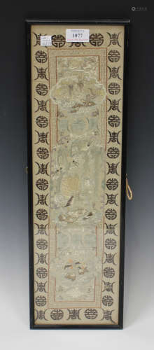 A Chinese silk embroidered sleeve panel, early 20th century, worked in coloured threads with bird