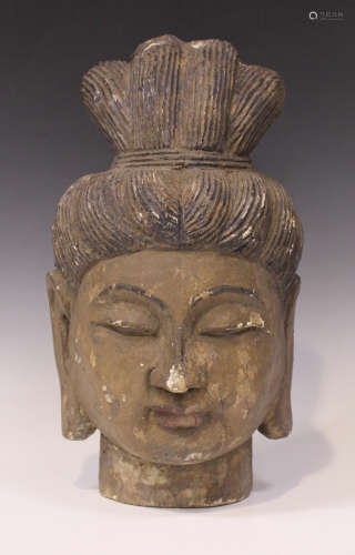 A Chinese Ming style carved and painted wood Guanyin head, height 39cm.Buyer’s Premium 29.4% (