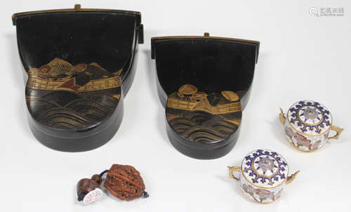 A Chinese carved walnut shell box, probably 18th century, decorated in relief with a group of