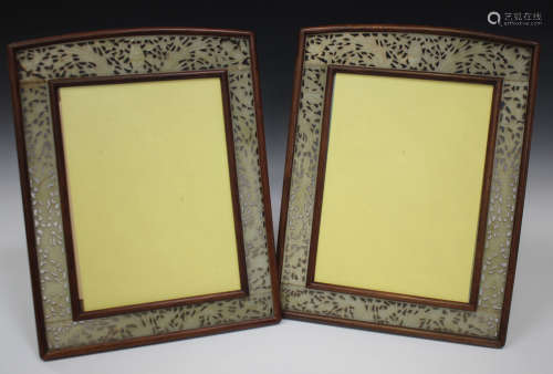 A pair of Chinese hardwood and jade photograph frames, early 20th century, each of slightly arched