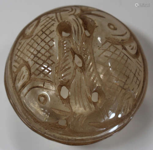 A Chinese rock crystal circular box and cover, 20th century, the dome top carved and pierced with