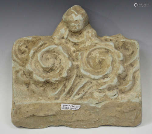 A South-east Asian pottery roof tile/frieze section, moulded in relief with a figurehead and