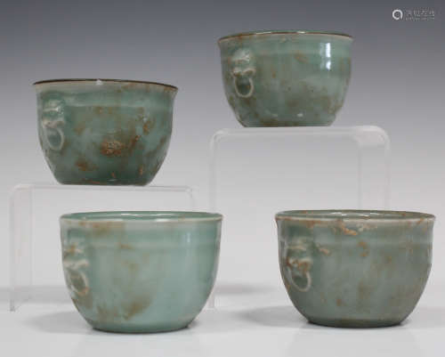 A set of four Chinese celadon glazed porcelain small pots, 20th century, each of circular jardinière