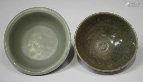 A Chinese celadon glazed bowl, Song dynasty, of circular form with vertical fluting to exterior,