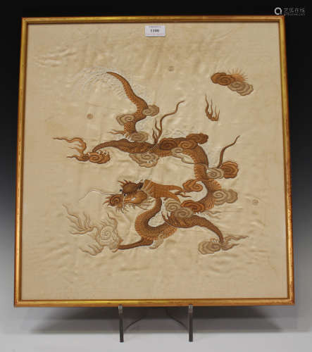 A Chinese silk embroidered rectangular panel, 20th century, worked in brown and cream threads