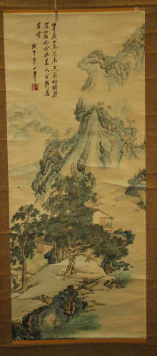 A Chinese hanging scroll painting, late Qing dynasty, depicting two figures and a pavilion in a