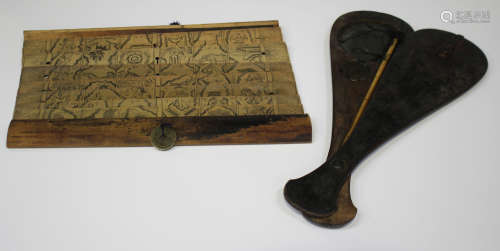 A Chinese hardwood cased opium scale, mid-19th century, the fish shaped case with metal mounts,