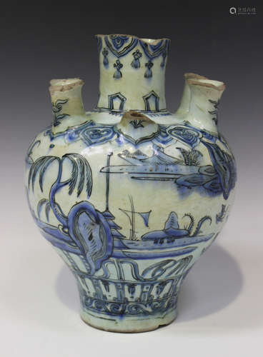 A Persian Safavid blue and white pottery tulip vase, 17th century, of baluster form with slightly