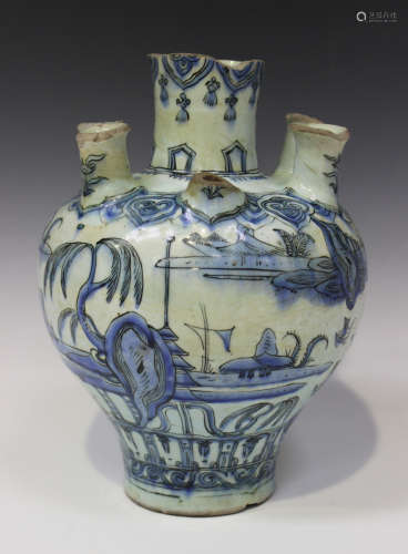 A Persian Safavid blue and white pottery tulip vase, 17th century, of baluster form with slightly