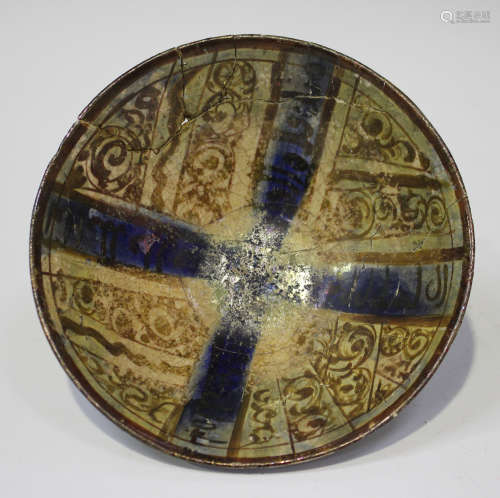 A Kashan lustre pottery bowl, possibly 14th/15th century, of circular conical form, the interior