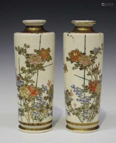 A pair of Japanese Satsuma earthenware vases, Meiji/Taisho period, each cylindrical body painted and