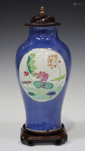 A Chinese famille rose and powder blue ground porcelain vase, mark of Kangxi but late 19th