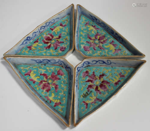 A set of four Chinese famille rose enamelled porcelain interfitting supper dishes, late Qing