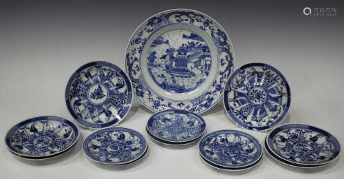 A Chinese blue and white porcelain plate, late Qing dynasty, painted with a coastal landscape within