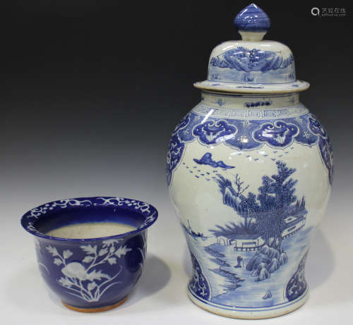 A Chinese blue and white porcelain jar and domed cover, modern, the baluster body painted with