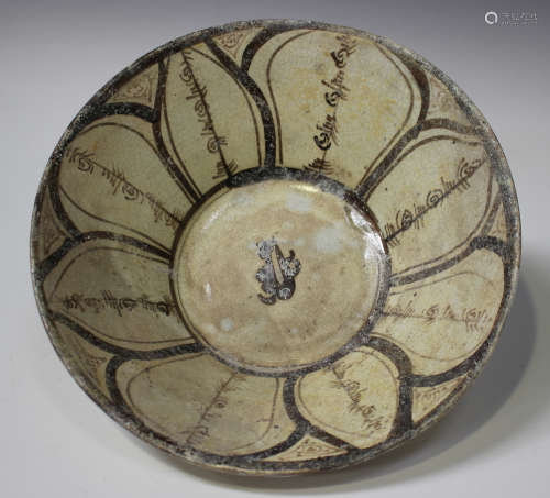 A Samarkand pottery bowl, possibly 10th/11th century, of circular form, the interior painted with