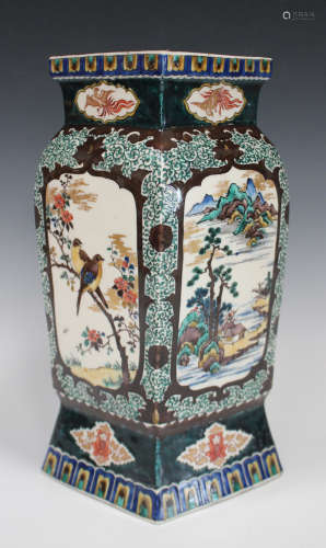 A Japanese Kutani porcelain vase, Meiji period, of lozenge section, painted with panels of birds and