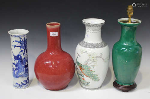 A Chinese sang-de-boeuf glazed bottle vase, 20th century, the globular body with narrow