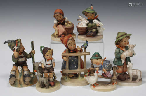Seven assorted Goebel Hummel figures, including Signs of Spring, Chick Girl, Playmates and