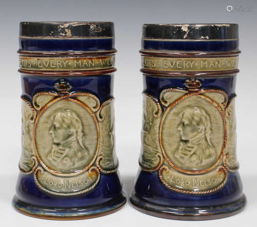 A pair of Royal Doulton Nelson Centenary commemorative stoneware beakers, early 20th century,