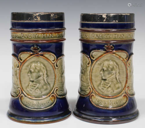 A pair of Royal Doulton Nelson Centenary commemorative stoneware beakers, early 20th century,