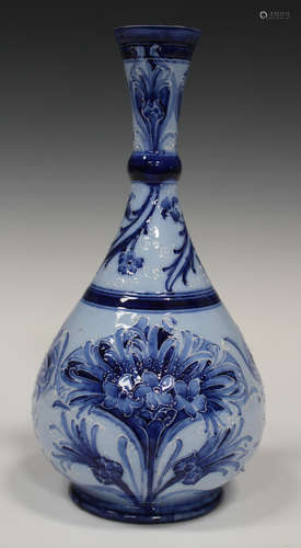 A Macintyre Moorcroft Florian Ware bottle vase, circa 1898-1902, decorated in shades of blue with