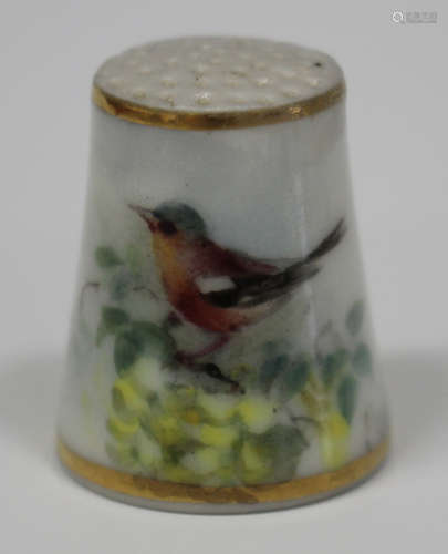 A Royal Worcester porcelain thimble, circa 1935, painted by Powell, signed, with a chaffinch perched