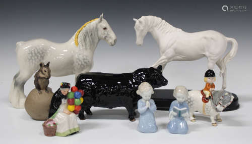 A Beswick Shire Mare in gloss grey, model No. 818, a Royal Doulton white glazed 'Spirit of Youth', a